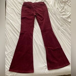 Boho/western style maroon bell bottoms from Molly Green boutique